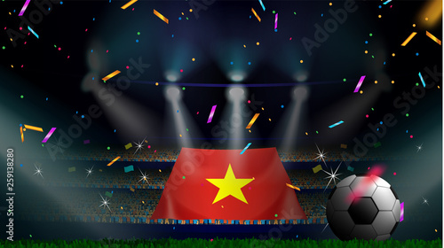 Fans hold the flag of Vietnam among silhouette of crowd audience in soccer stadium with confetti to celebrate football game. Concept design for football result template