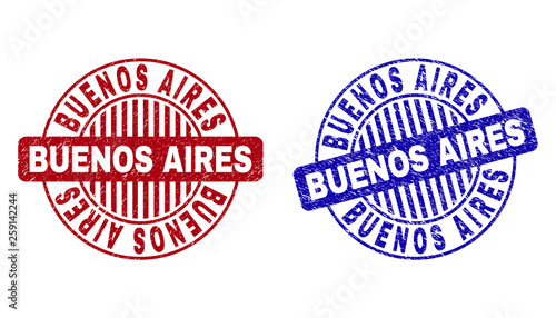 Grunge BUENOS AIRES round stamp seals isolated on a white background. Round seals with distress texture in red and blue colors.