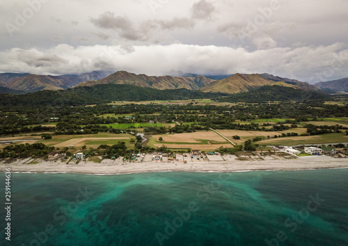 High Angle drone Picture of a beach and Mountains in Zambales, Philippines