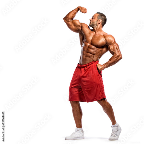 Body Builder Flexing Muscles