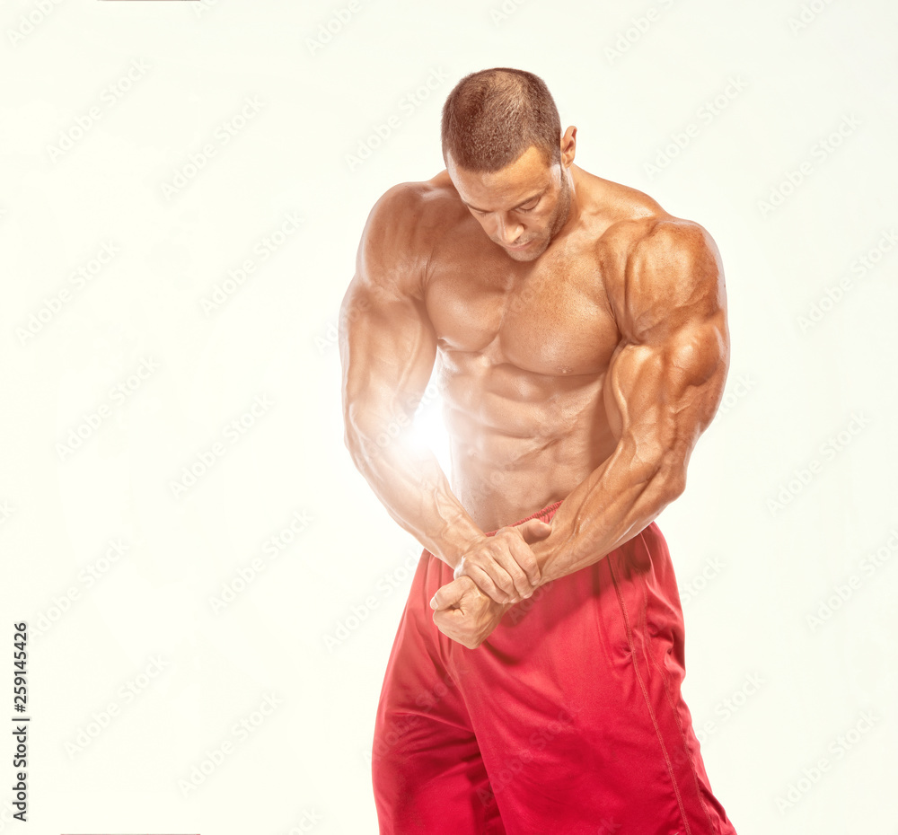Fototapeta premium Body Builder Flexing Muscles