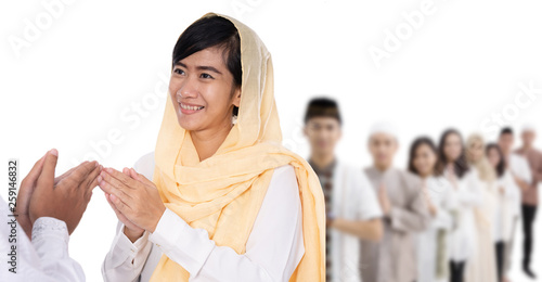 muslim woman hand touching greeting traditional asian islamic  eid mubarak celebration © Odua Images