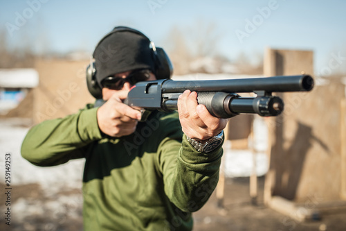 Tactical combat pump gun shooting training. Shotgun weapon action course