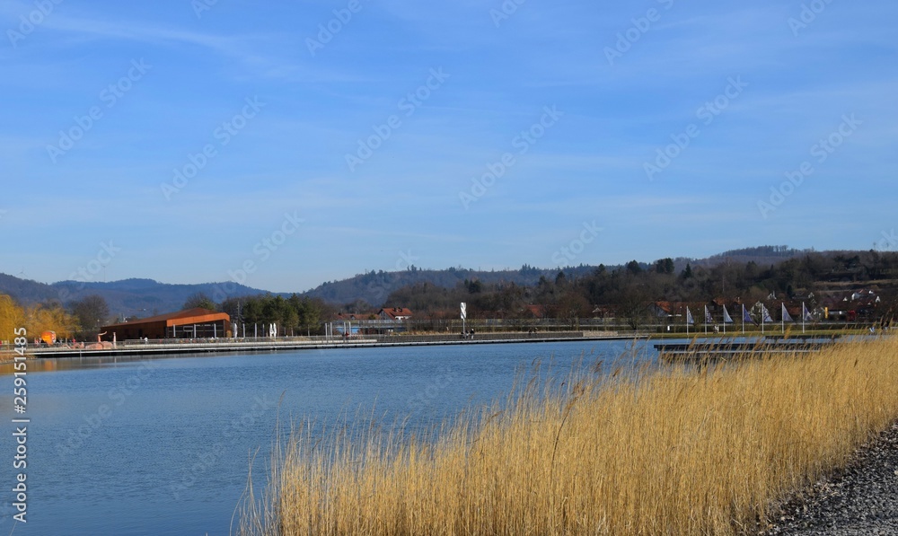 Obraz premium view across a man made lake at Lahr on the site of the Landesgartenschau, Spring scene