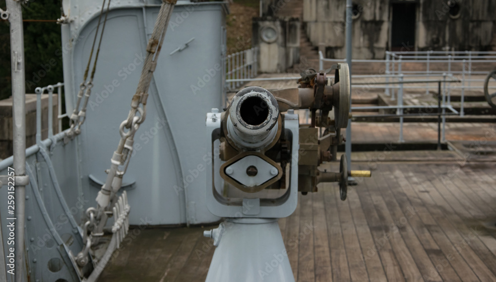 Fototapeta premium Muzzle of an old anti aircraft cannon on a ship