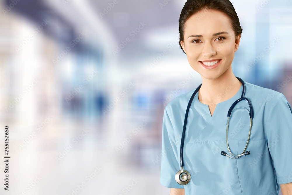 Young man doctor holding stethoscope