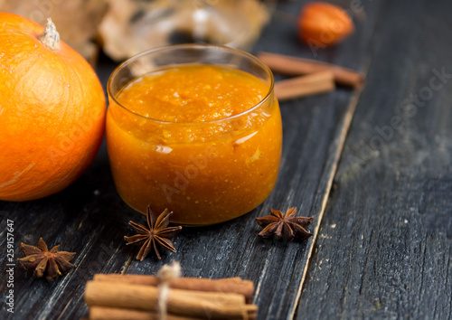 Homemade Pumpkin puree/jam on wooden background