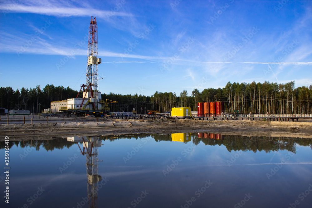 reflection in the water rig in the morning sun in the forest