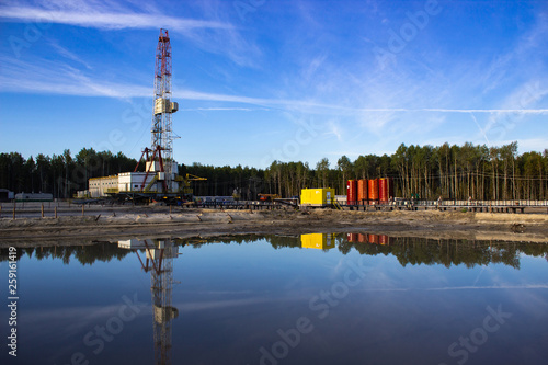 reflection in the water rig in the morning sun in the forest