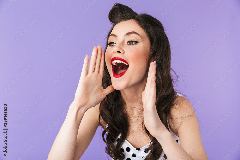 Portrait of a beautiful pin-up girl wearing bright makeup Portrait of a beautiful pin-up girl wearing bright makeup