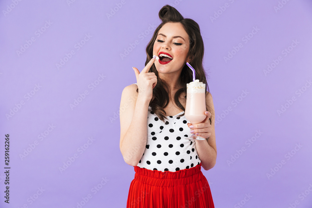 Portrait of a beautiful pin-up girl wearing bright makeup Portrait of a beautiful pin-up girl wearing bright makeup