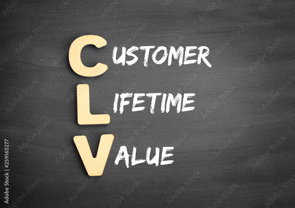 Obraz premium Wooden alphabets building the word CLV - Customer Lifetime Value acronym on blackboard