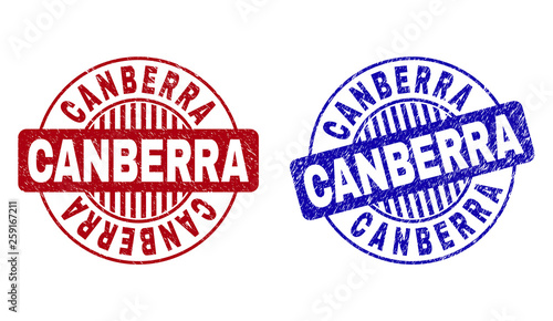 Grunge CANBERRA round stamp seals isolated on a white background. Round seals with grunge texture in red and blue colors. Vector rubber imprint of CANBERRA label inside circle form with stripes.