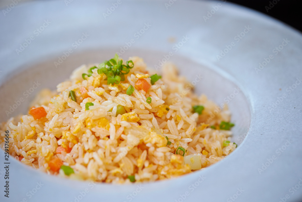 Fried rice, carrot, onion and spring onion Fried rice, carrot, onion and spring onion