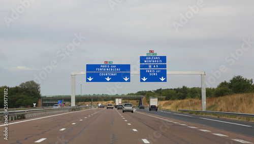 traffic signal to go to Paris on the motorway photo