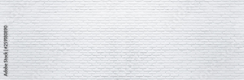 Abstract white brick wall texture background. Horizontal panoramic view of masonry brick wall.