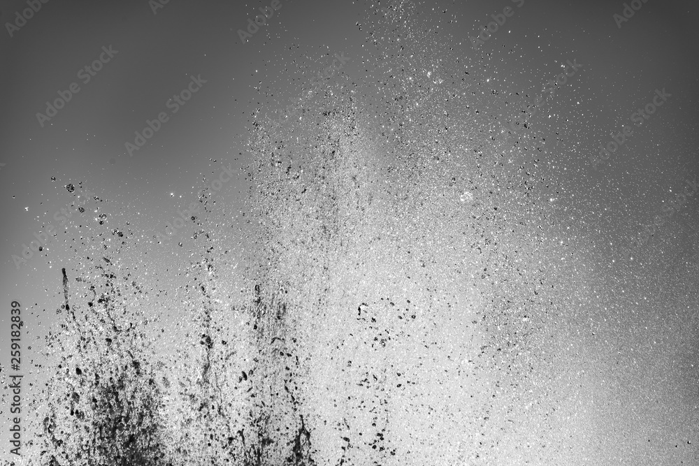 Monochrome background with water bursts