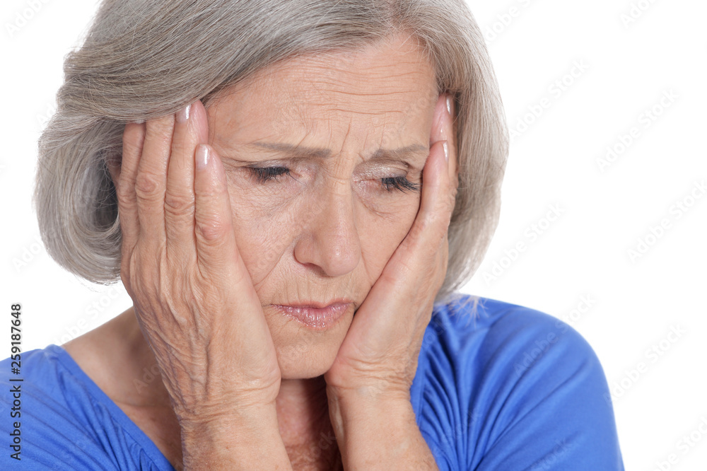 Portrait of sad senior woman on white background Portrait of sad senior woman on white background