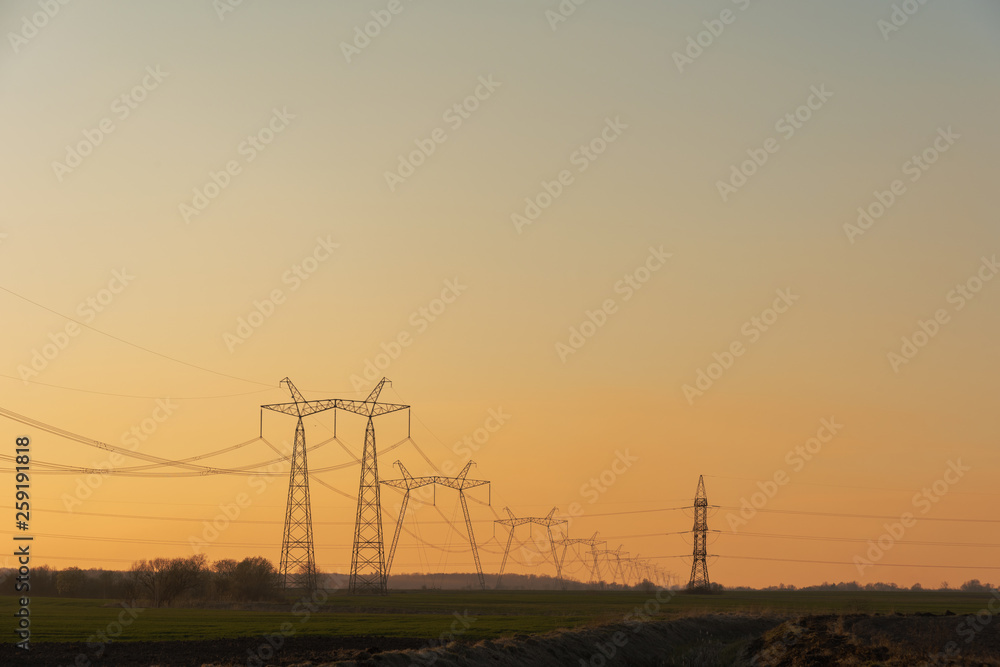 View of electrics, electric lines on the background of blue sky and good weather.	