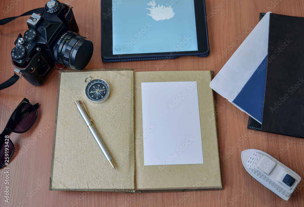 Notebook with pen, passport, ticket, camera, Notebook with pen, passport, ticket, camera,