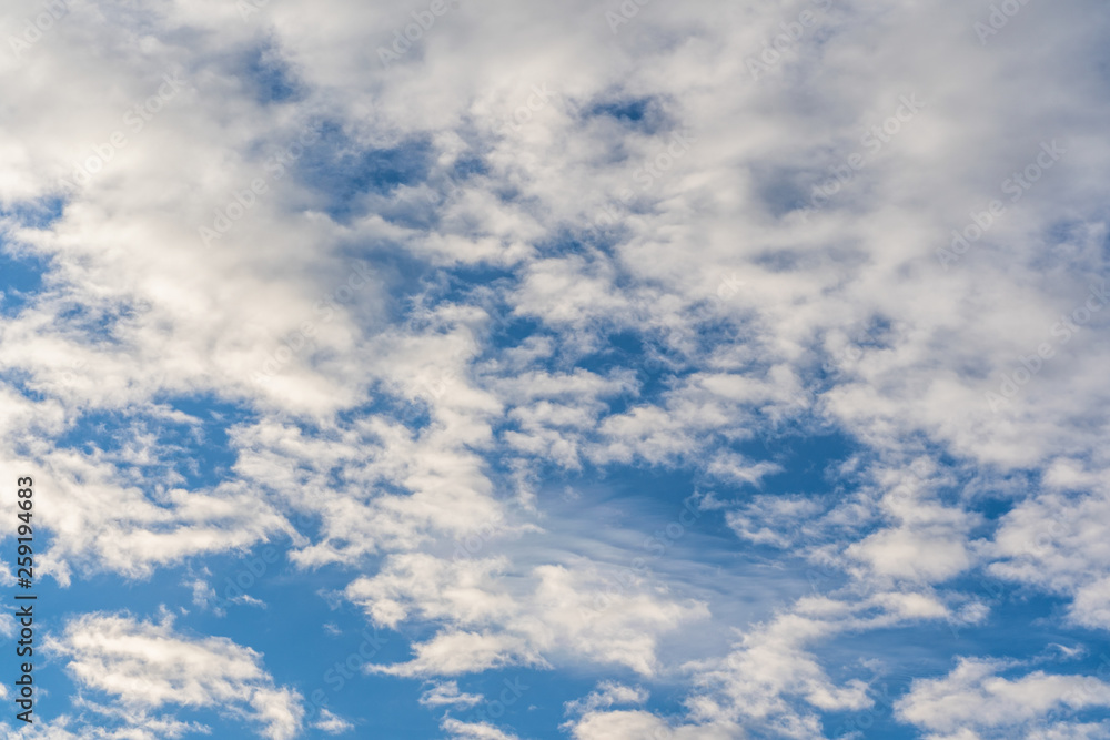 Blue Skies With Dramatic Cloud Formation on Sunny Winter Day - Abstract.