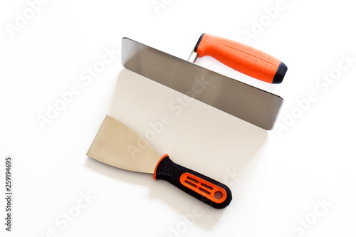 Trowel for decorative plaster is the main tool builder finisher. On a white background close up