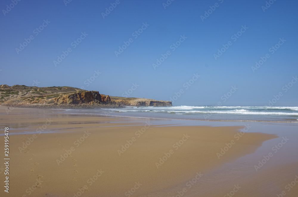 A view of beautiful Bordeira beach, famous surfing place in Algarve region, Portugal
