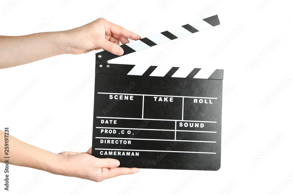 Female hands holding clapper board on white background