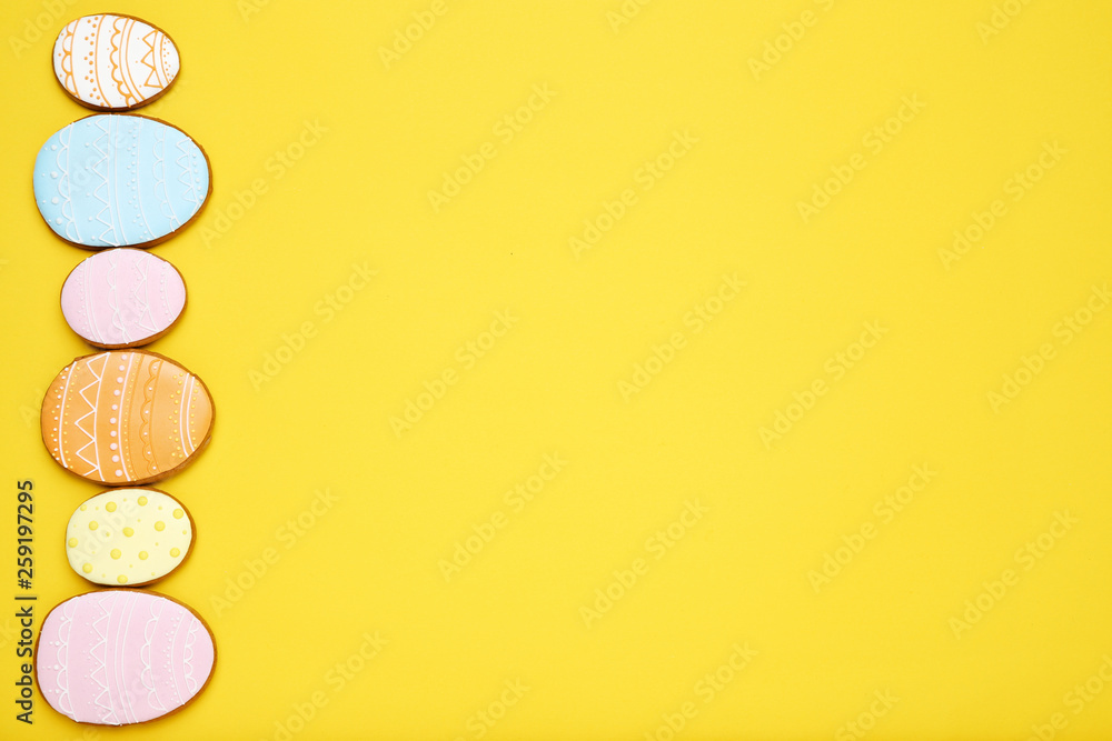 Easter gingerbread cookies on yellow background Easter gingerbread cookies on yellow background