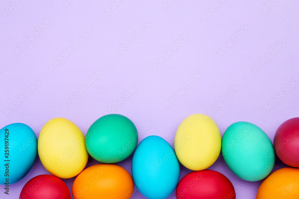 Colorful easter eggs on purple background Colorful easter eggs on purple background