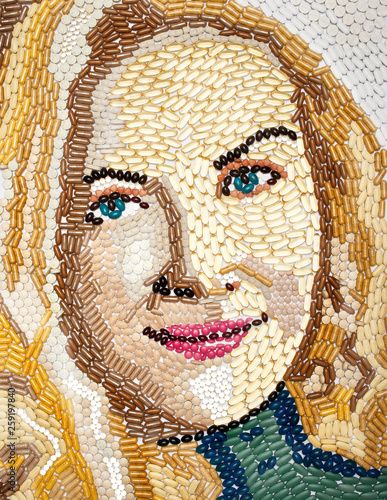 Woman's face made with capsules