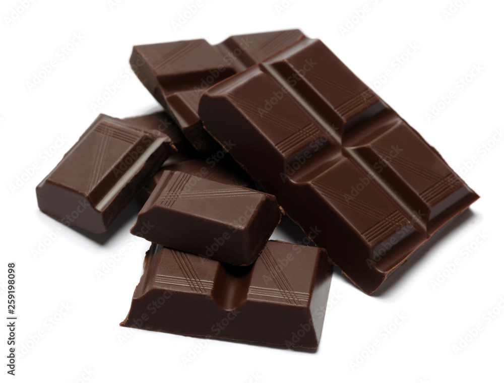 Dark organic chocolate pieces isolated on white background Dark organic chocolate pieces isolated on white background