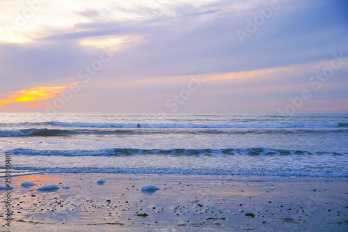 Beautiful colorful sunset over the beach and sea. Beautiful sky twilight time and reflection on the sea. peaceful moment. San Elijo State Beach  Encinitas  San Diego  California