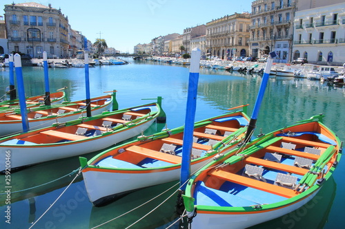 Colorful traditional boats in Sete, a seaside resort and singular island in the Mediterranean sea, it is named the Venice of Languedoc Rousillon, France photo