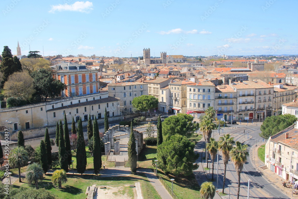 Fototapeta premium Beautiful aerial view over the historic center and St. Peter's Cathedral in Montpellier, city in southern France and capital of the Herault department