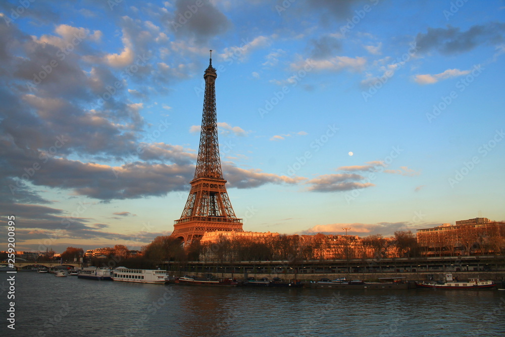 Naklejka premium Beautiful sky over the Eiffel tower and river seine, Paris capital and the most populous city of France