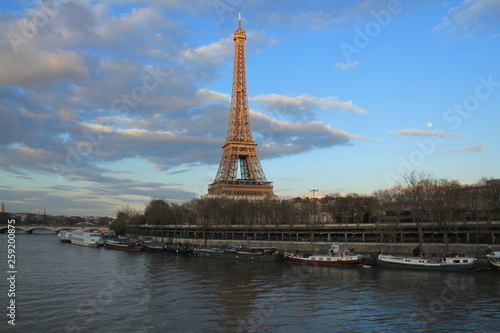 Beautiful sky over the Eiffel tower and river seine, Paris capital and the most populous city of France