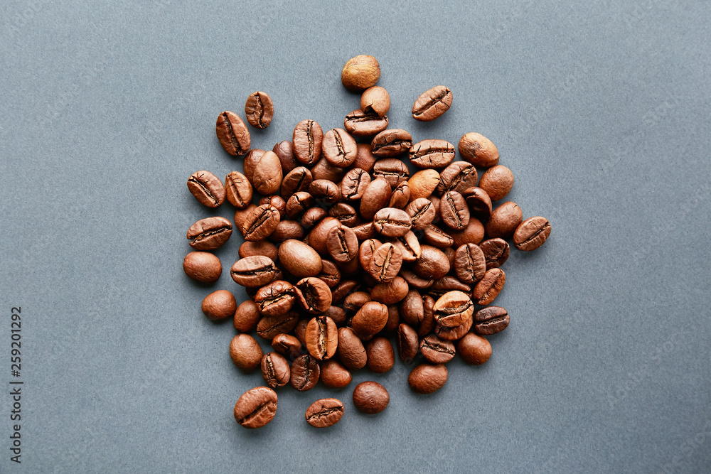 Scattered coffee beans frame design on copy space background. Scattered coffee beans frame design on copy space background.