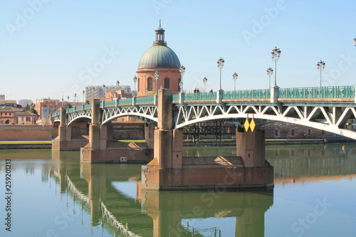 The Saint Pierre bridge passes over the Garonne river and Hospital de La Grave in Toulouse, Haute Garonne, Occitanie, France