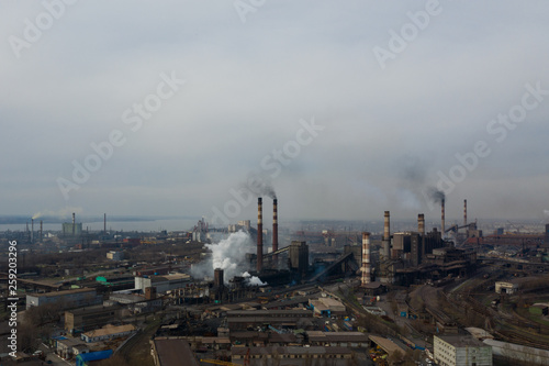 Polluting plant shot from above with a drone