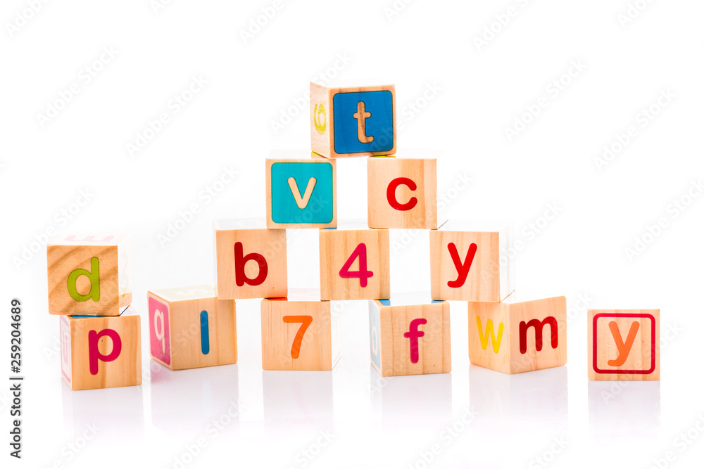Toy cubes. Baby collection. ABC letters made from baby toys Toy cubes. Baby collection. ABC letters made from baby toys