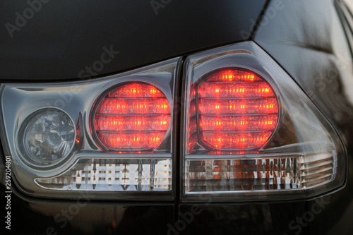 red stop signal in a black premium car