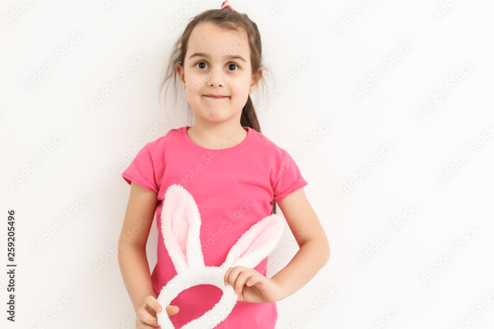 Happy lost tooth little girl wearing funny bunny ears Happy lost tooth little girl wearing funny bunny ears