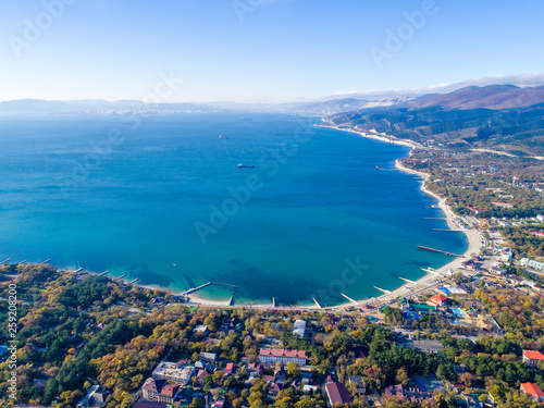 panorama of the village Kabardinka from a bird's eye view. In the foreground of the Kabardinka resort, on the back of the Tsemes Bay and the port of Novorossiysk. On the right the Markoth Ridge 