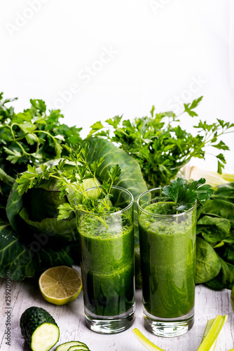 Healthy smoothie for breakfast with green spinach and apple.
