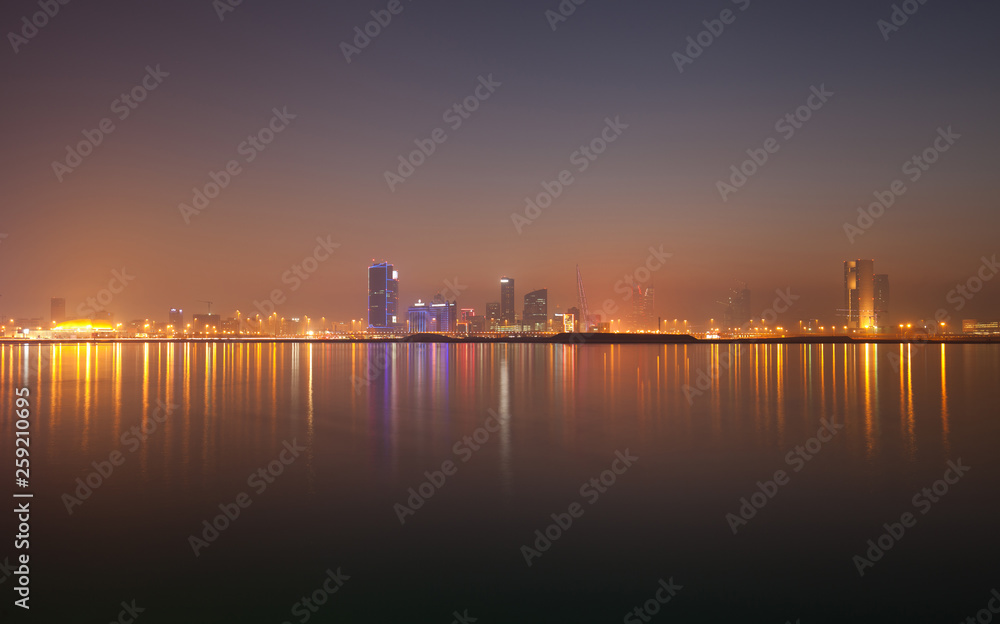 A beautiful view of Bahrain skyline during evening hours at sunset A beautiful view of Bahrain skyline during evening hours at sunset