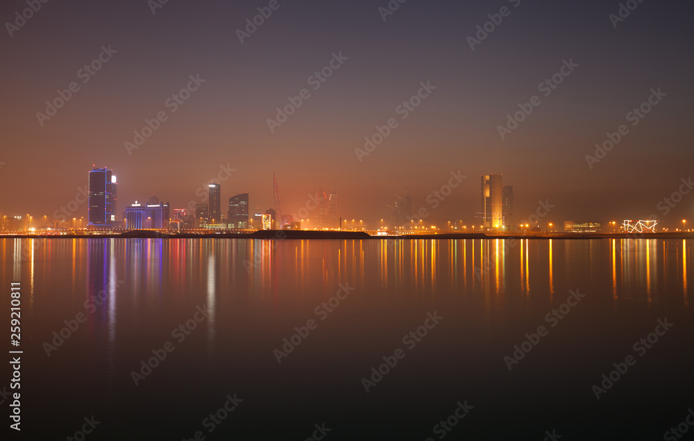 A beautiful view of Bahrain skyline during evening hours at sunset A beautiful view of Bahrain skyline during evening hours at sunset