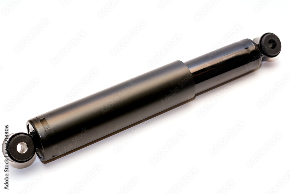 Black shock absorber for trucks on a white background with clipping path. Black shock absorber for trucks on a white background with clipping path.