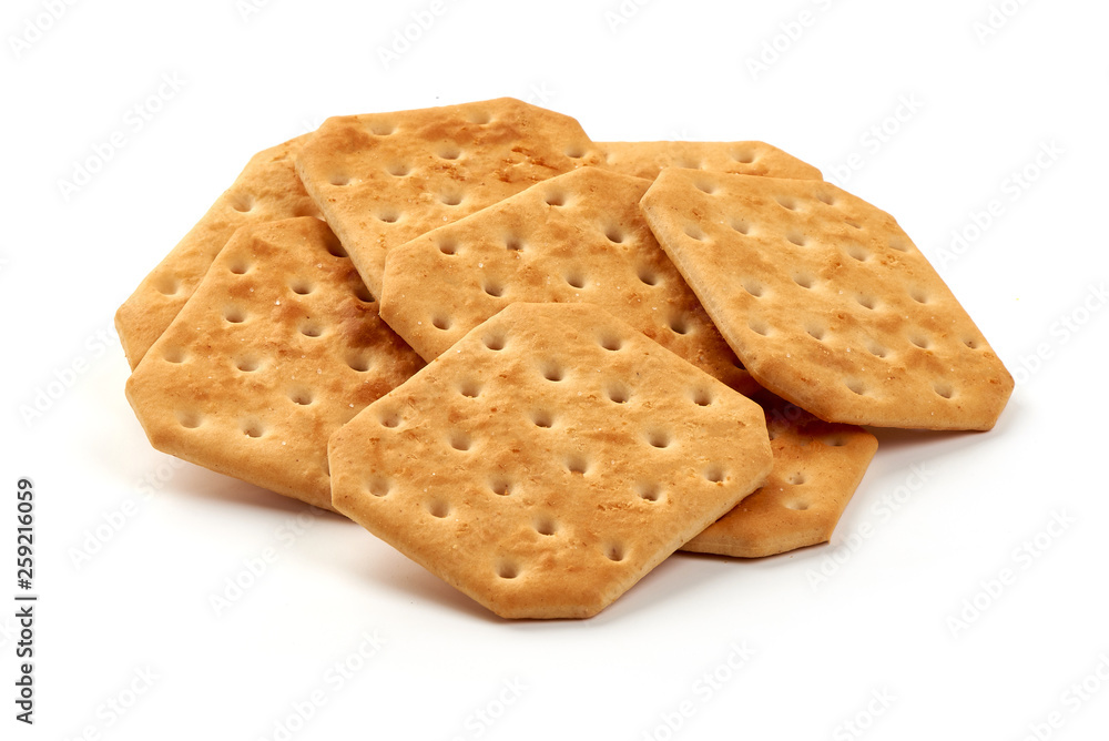 Salted cracker biscuits, close-up, isolated on white background