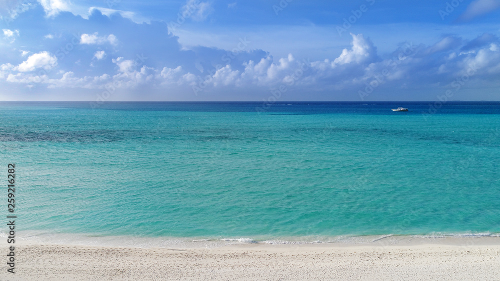 Beautiful aerial view of Maldives and tropical beach . Travel and vacation concept